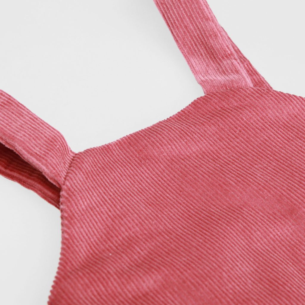 dettaglio bretelle pagliaccetto in velluto