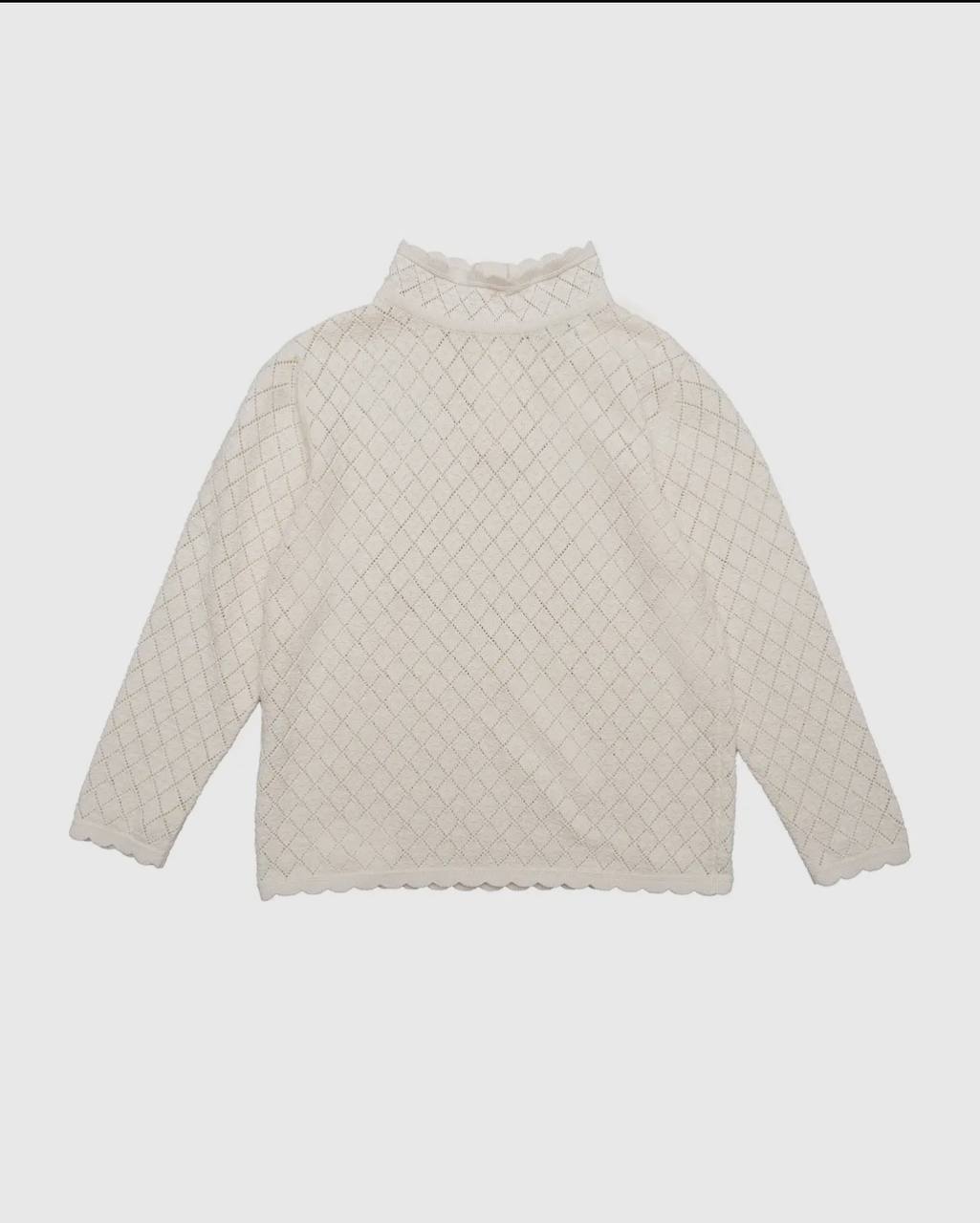 Maglioncino bimba lavorazione a maglia traforata a rombi.