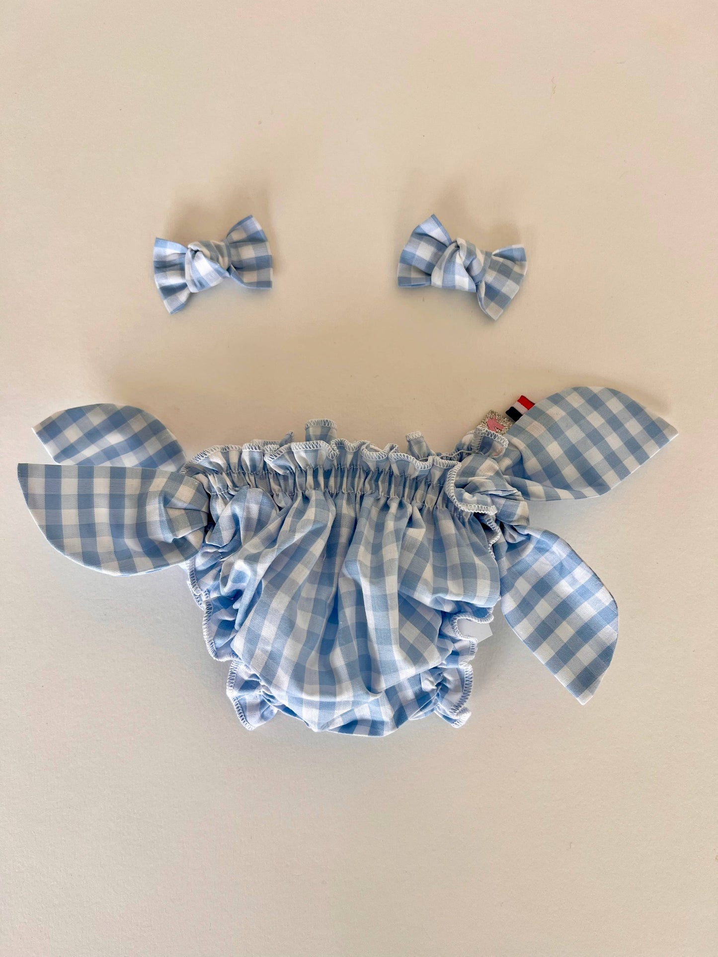 Costume da bagno a quadretti azzurri