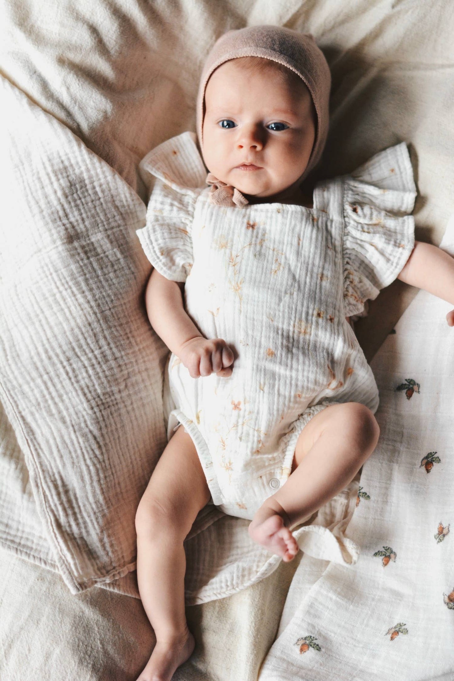 Tutina neonato in mussola di cotone 100% con stampa floreale