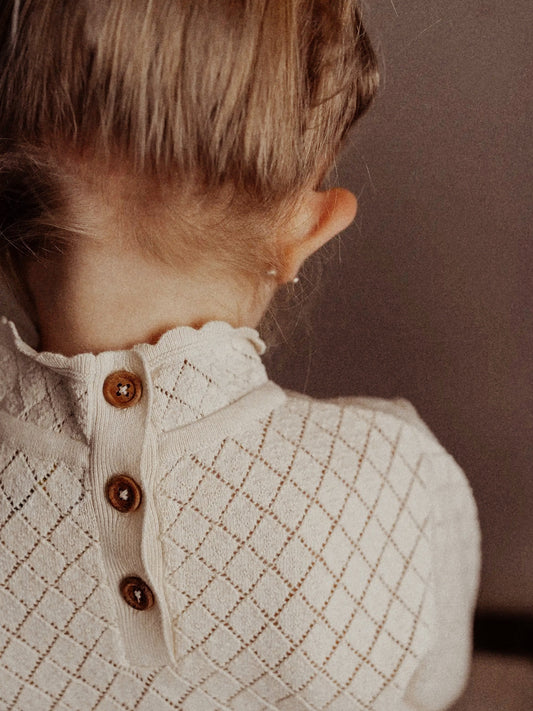 Maglioncino bimba lavorazione a maglia traforata a rombi