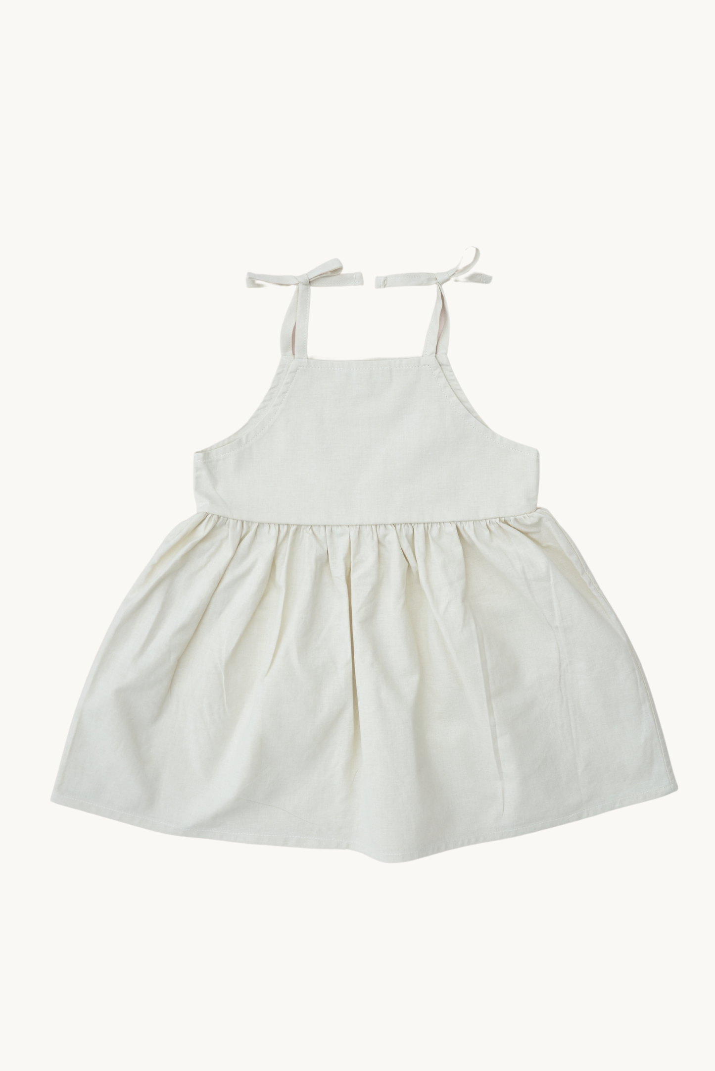 Vestito estivo beige ricamato per bambina in 100% cotone