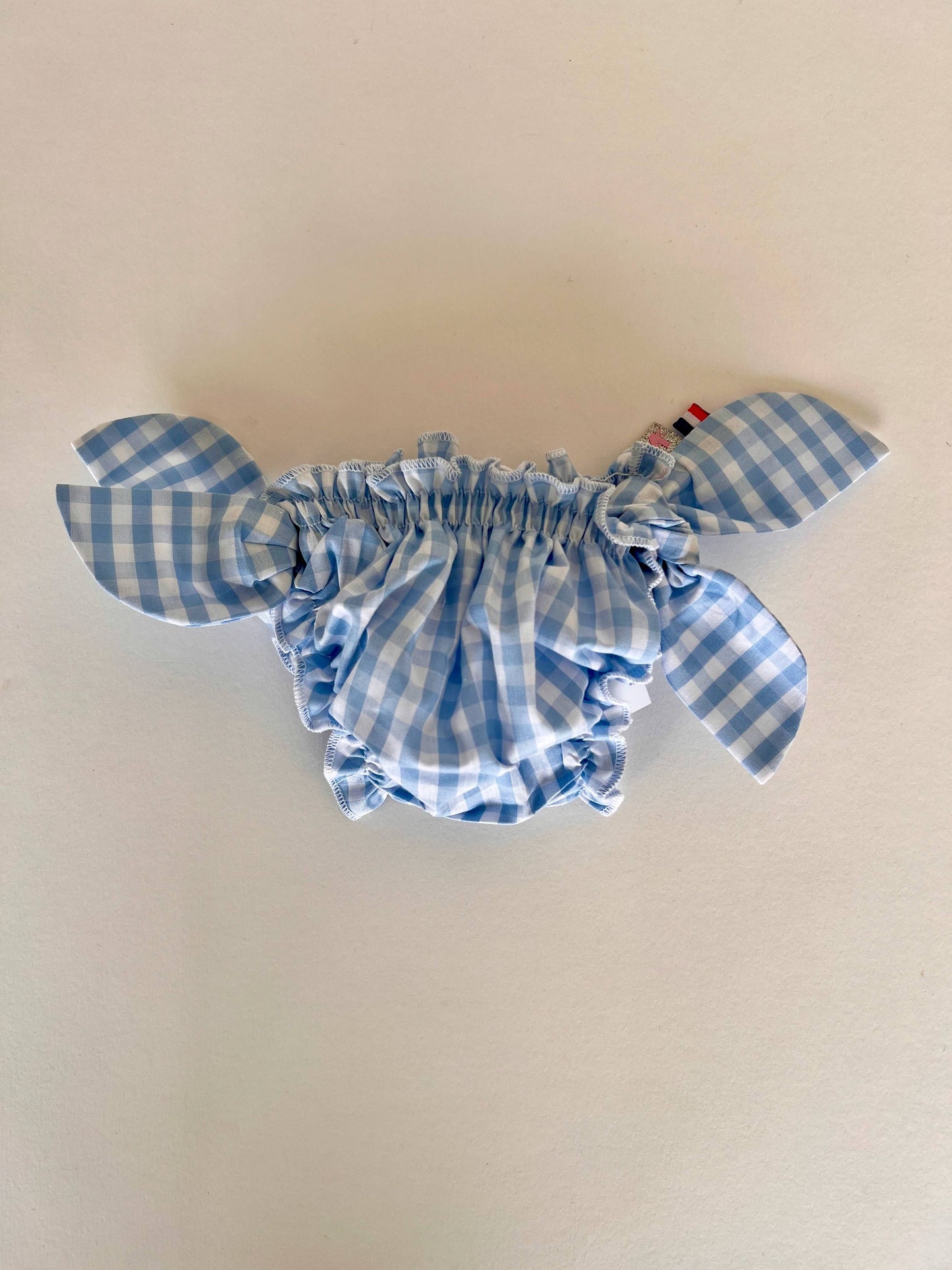 Costume da bagno a quadretti azzurri
