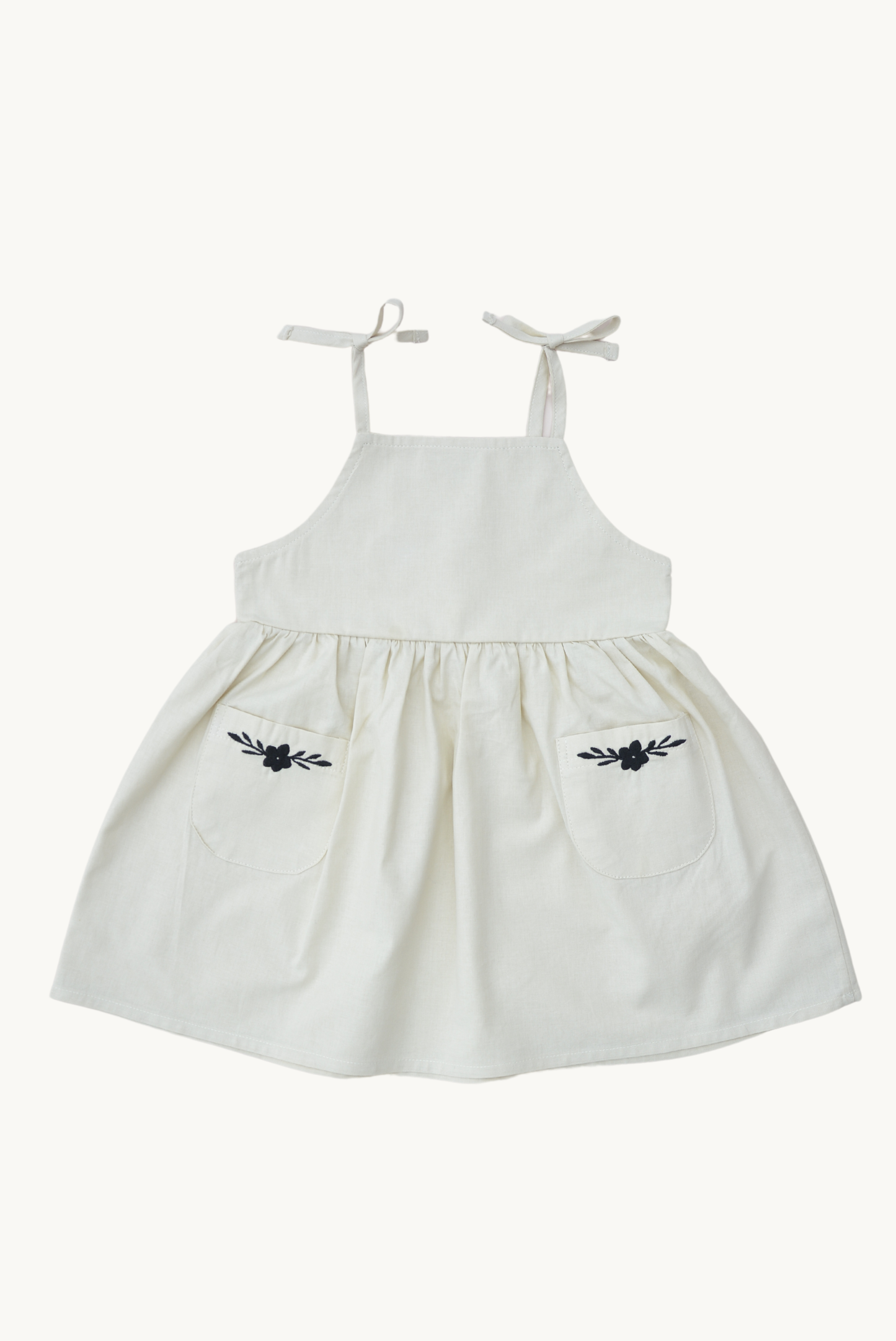 Vestito estivo beige ricamato per bambina in 100% cotone