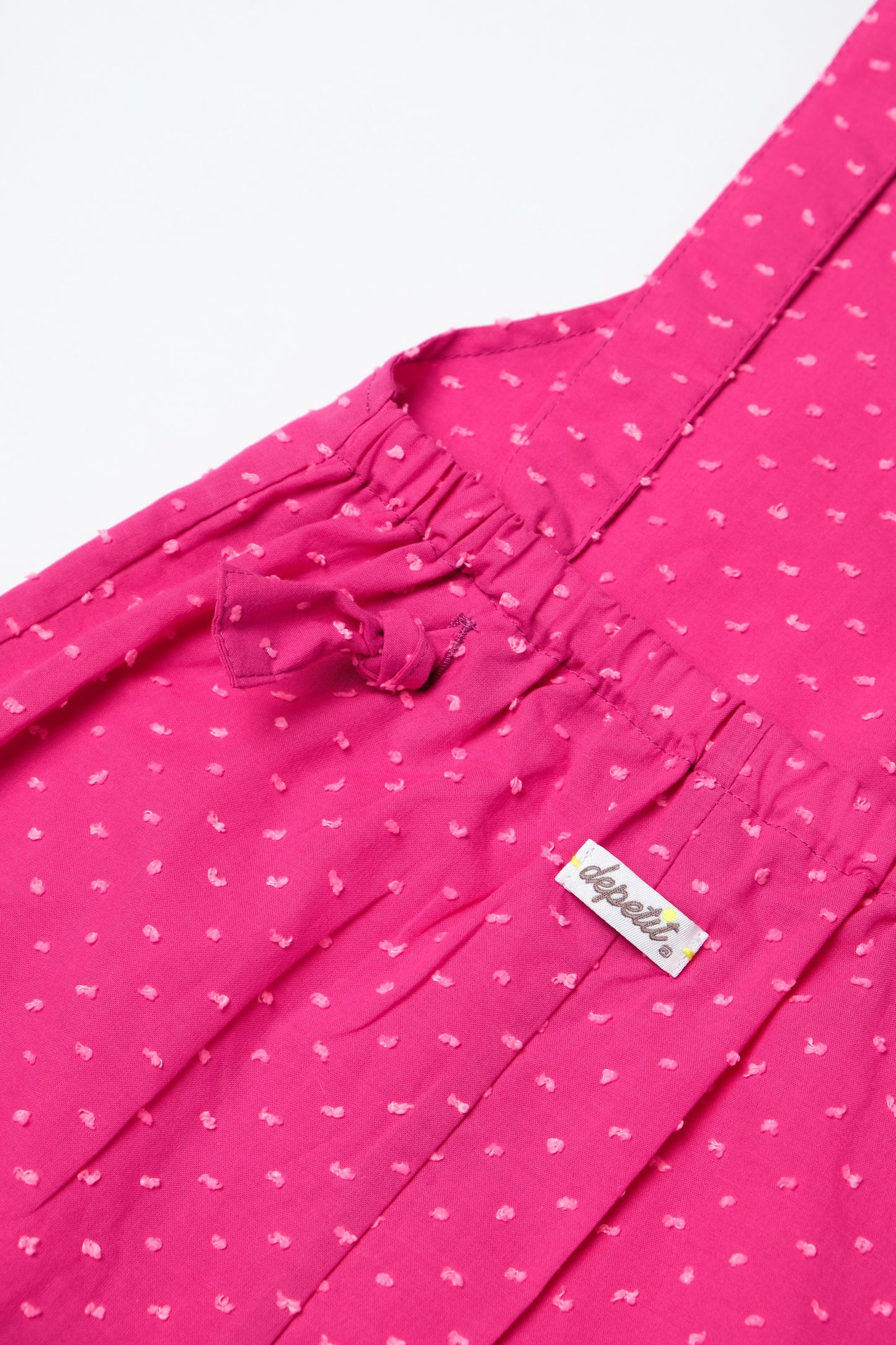 Salopette bambina in fresco cotone colore fucsia