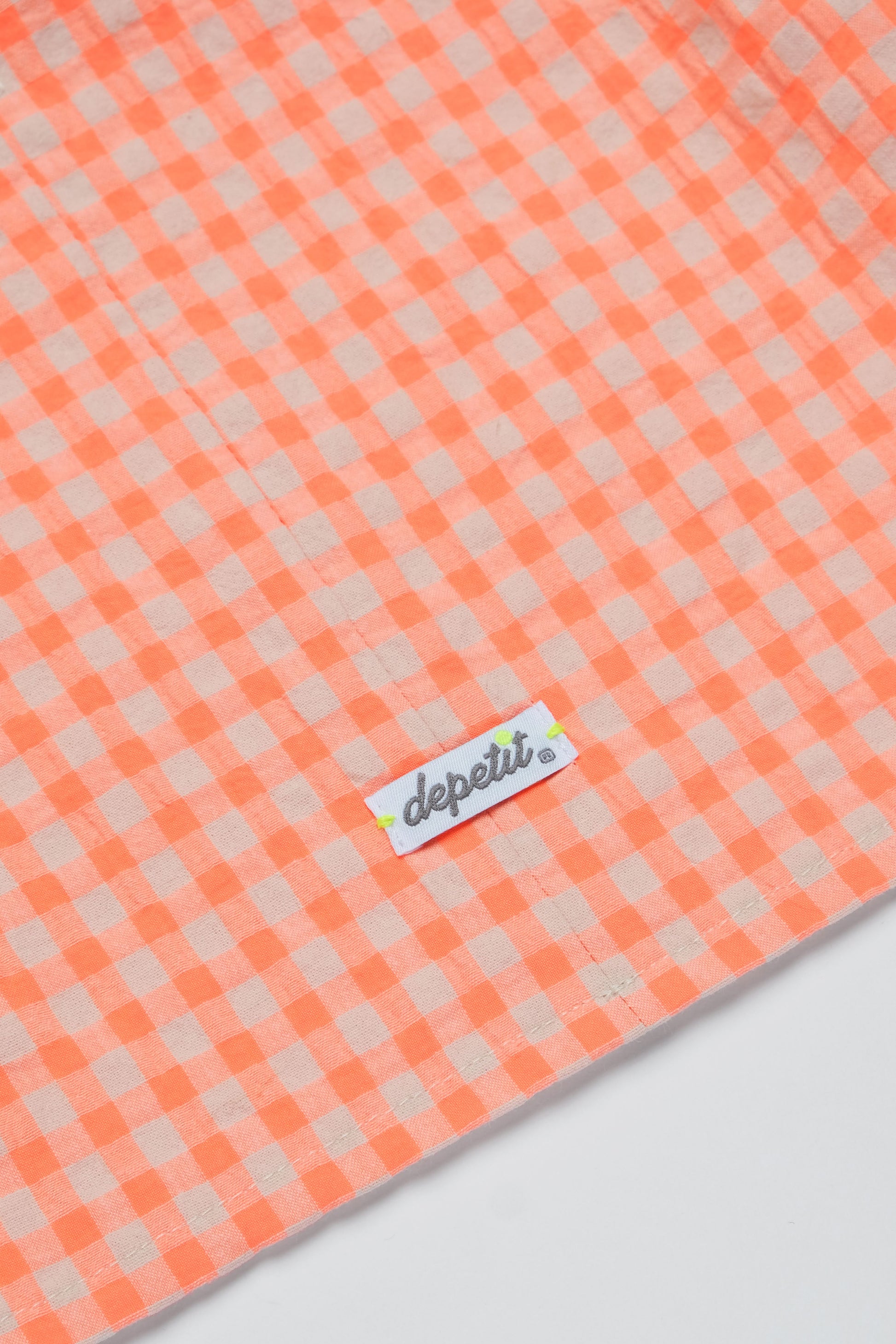 Toppino bambina colore arancione con quadri