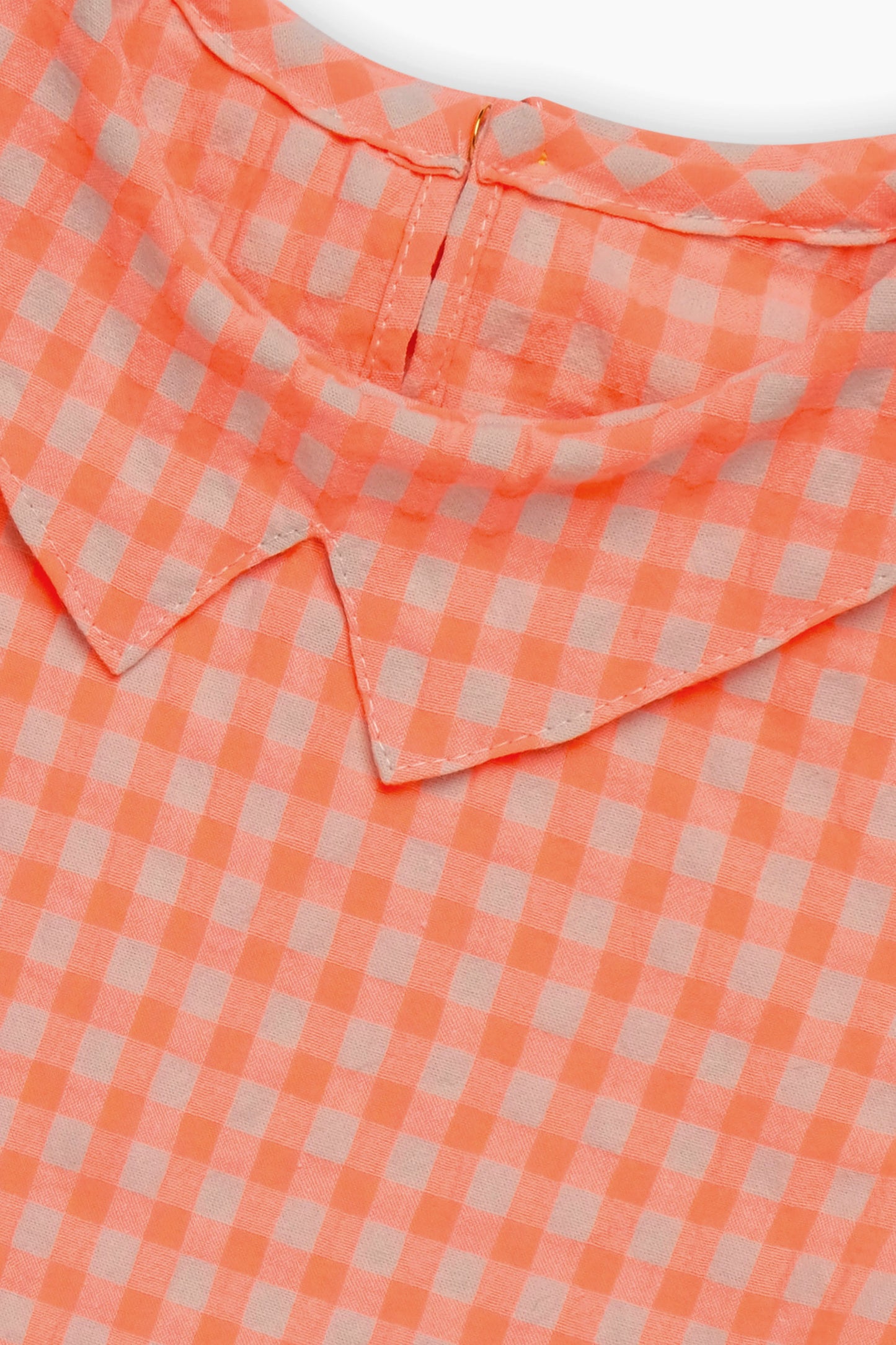 Toppino bimba colore arancione con quadri
