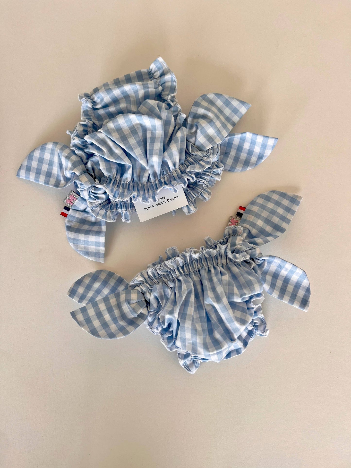 Costume da bagno a quadretti azzurri